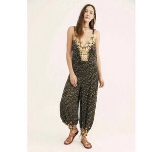 Free People “Blissed Out” harem floral jumpsuit M